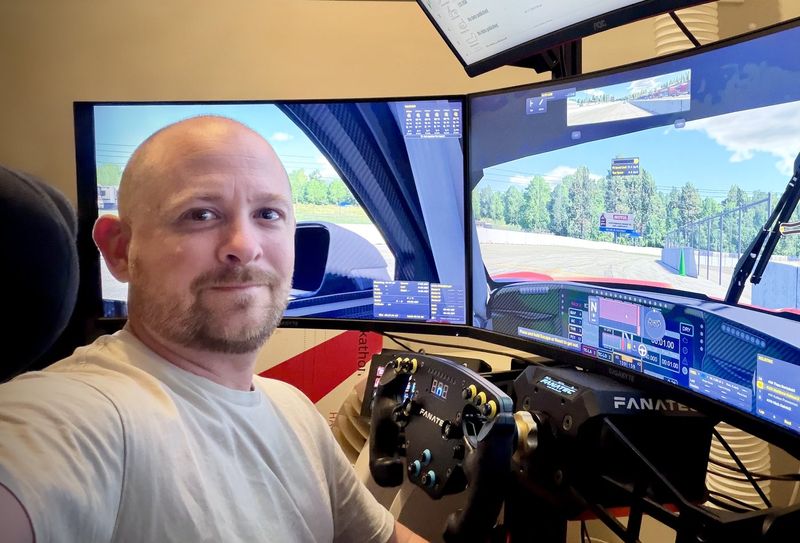 Matthew in the sim rig in his garage